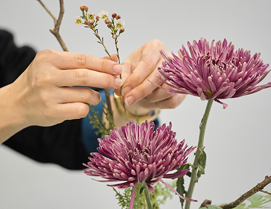 Participants are arranging flowers